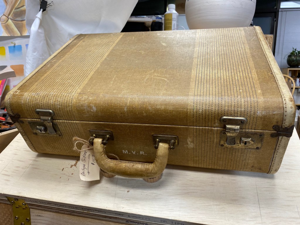 Tweed style suitcase