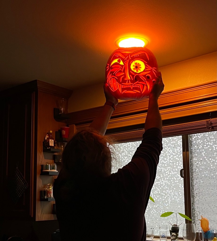 freshly carved jack o'lantern being tested for visuals.